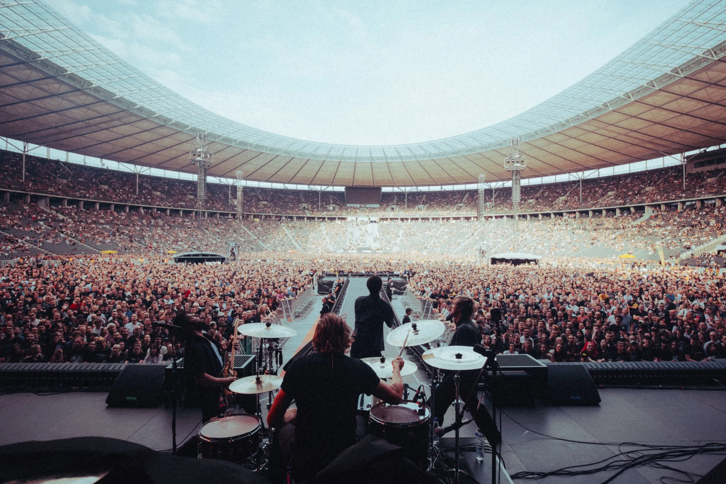 View from the stage looking out at a packed stadium crowd